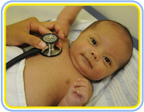 monitoring vitals of baby with stethoscope of baby